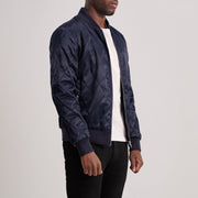 
Blue Satin Varsity Jacket - 展现肩线贴合与利落下摆的背部视角