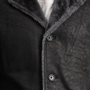 
细节特写 of Notch & Button Hardware on Kolby Distressed Black Shearling Long Coat