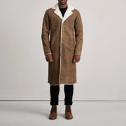 
Kolby Distressed Brown Shearling Long Coat - 展现立体袖型与合身版型的侧身视角