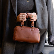 Styled Fit Perspective of Dalford Full-Grain Leather Handbag 女士 on Model - Natural Daylight Drape