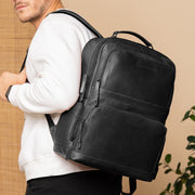 Classic 100% Full-Grain leather Backpack - Rear Perspective Showing Reinforced Leather Straps &amp; Stitching