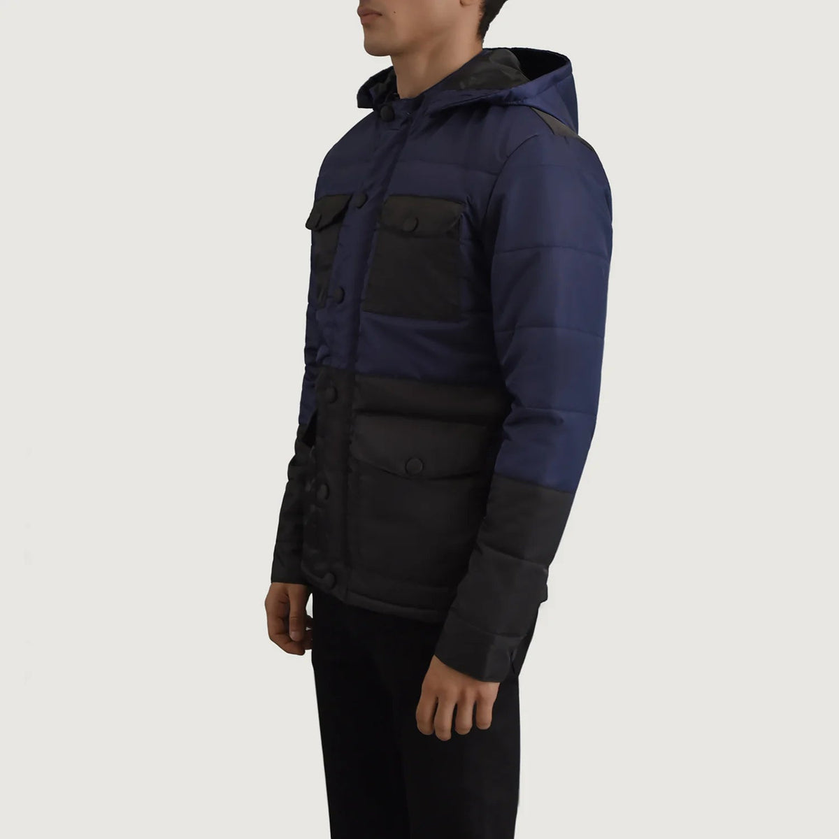 
Black + Blue Full-Grain Leather Hooded Jacket - 展现肩线贴合与利落下摆的背部视角