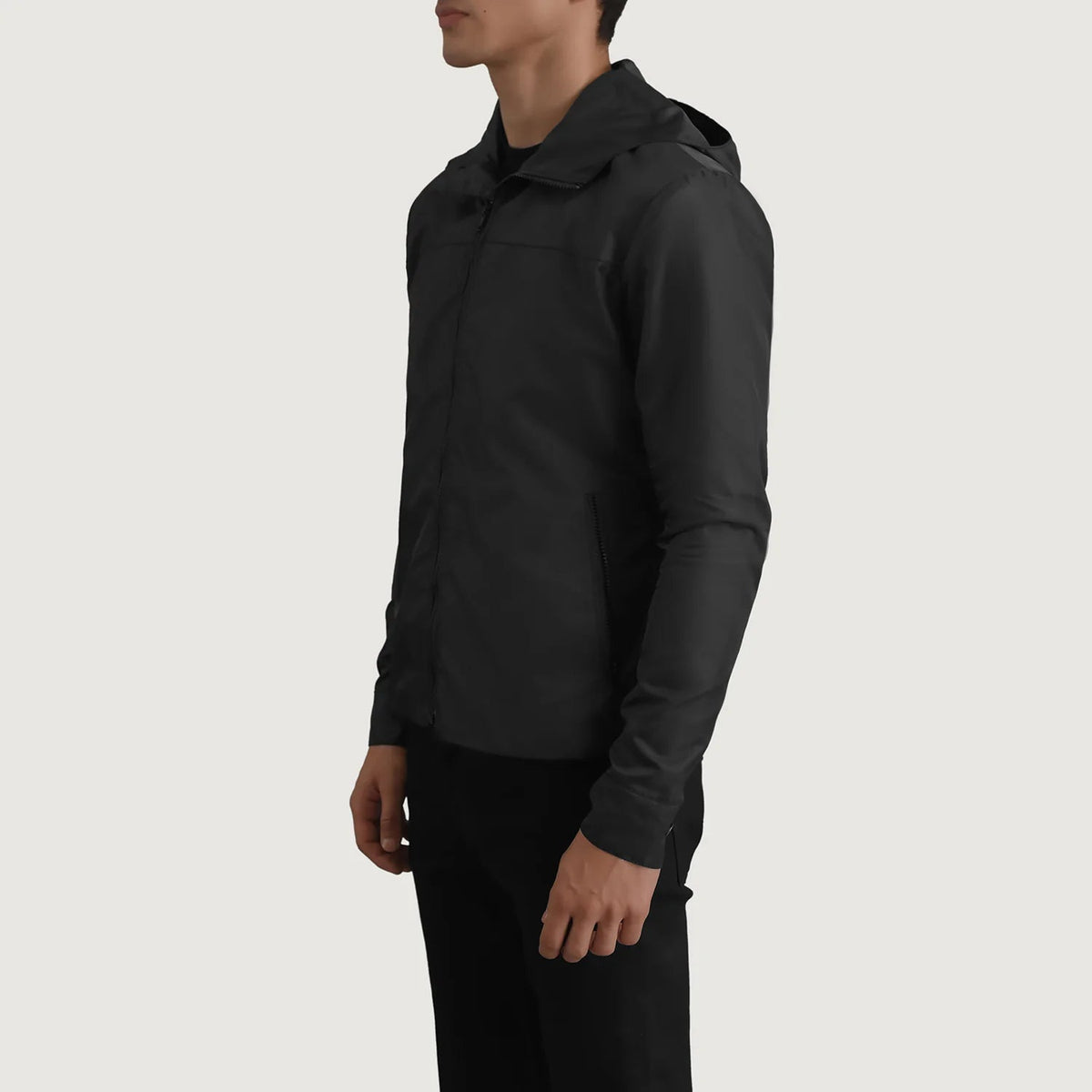 
Black Full-Grain Leather Hooded Jacket - 展现肩线贴合与利落下摆的背部视角